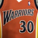 MN Heat Pressed Retro : SW Warriors 09/10 Orange No.30 Curry - Image 5